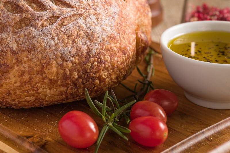 Wood-fired garlic bread with herbs and olive oil