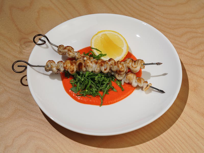 Golden fried calamari with lemon and marinara sauce